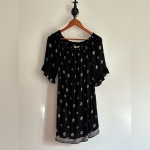 Elegant Black Dress with White Patterns